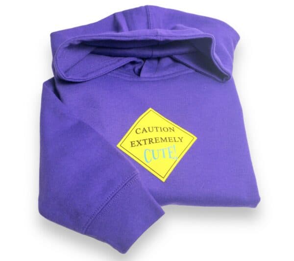 A purple hoodie with a yellow caution sign on it.