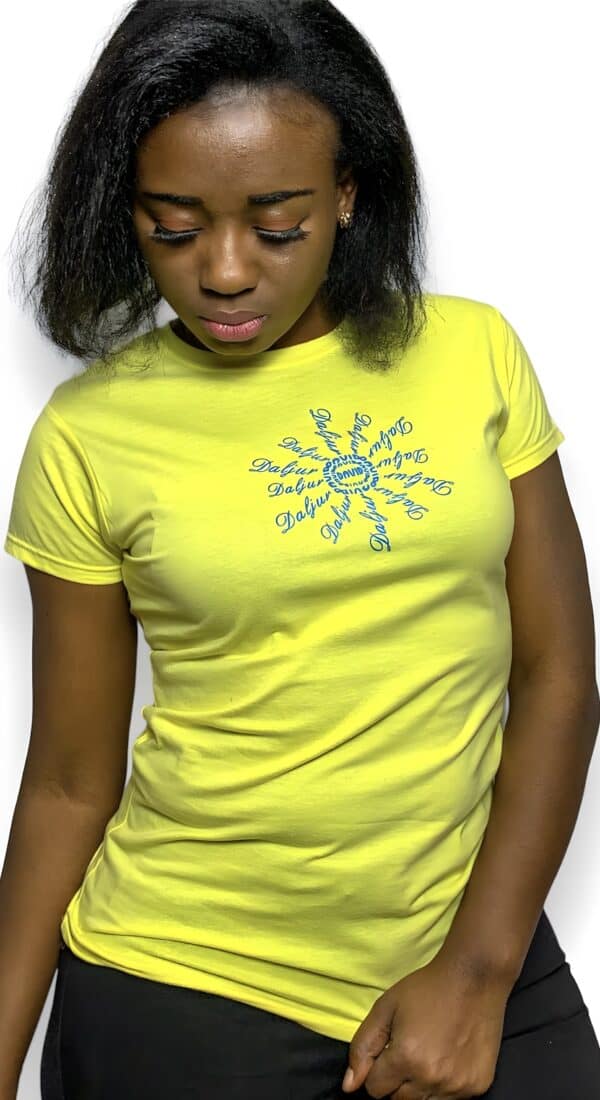 A woman wearing a yellow shirt with a blue sun on it.