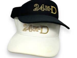 A black and white hat with the words " 2 4 k-d ".