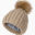 A beige hat with a brown pom-pom on top of it.