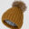 A brown hat with a pom-pom on top of it.